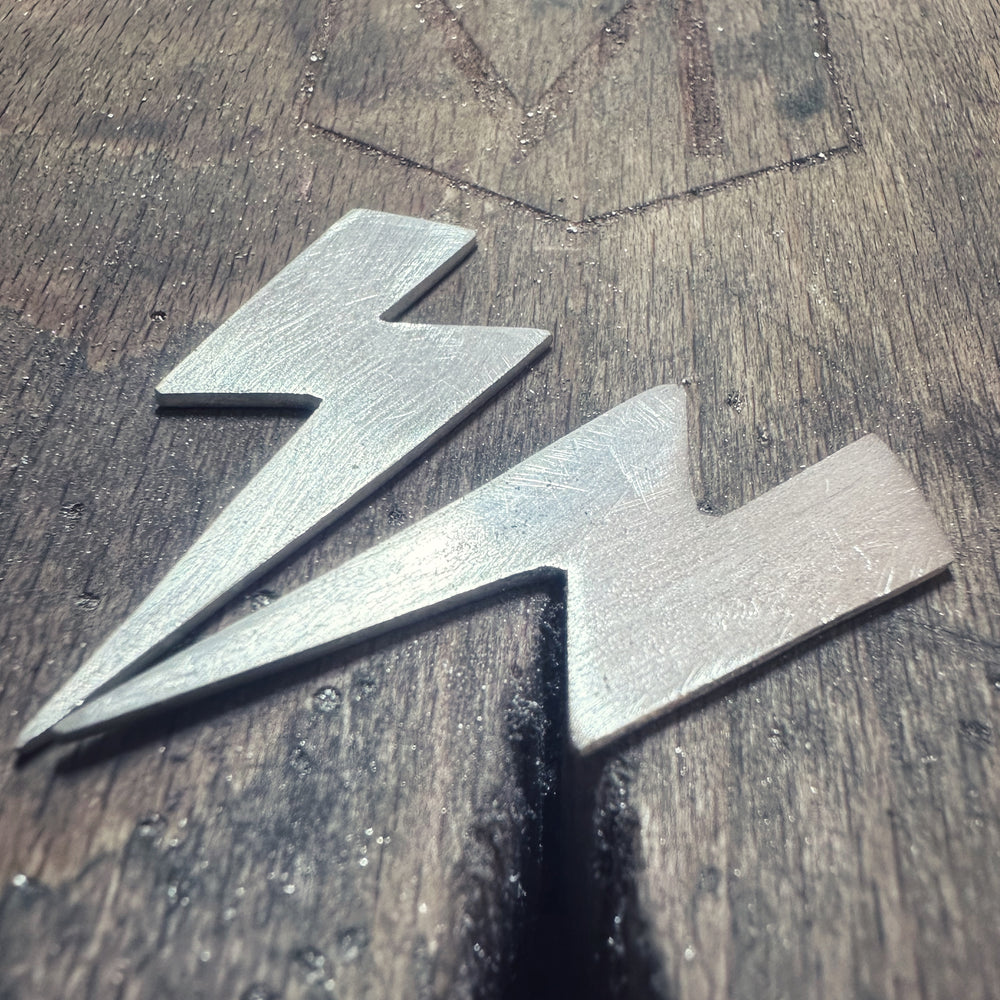 
                      
                        Thunderstruck Statement Earrings
                      
                    