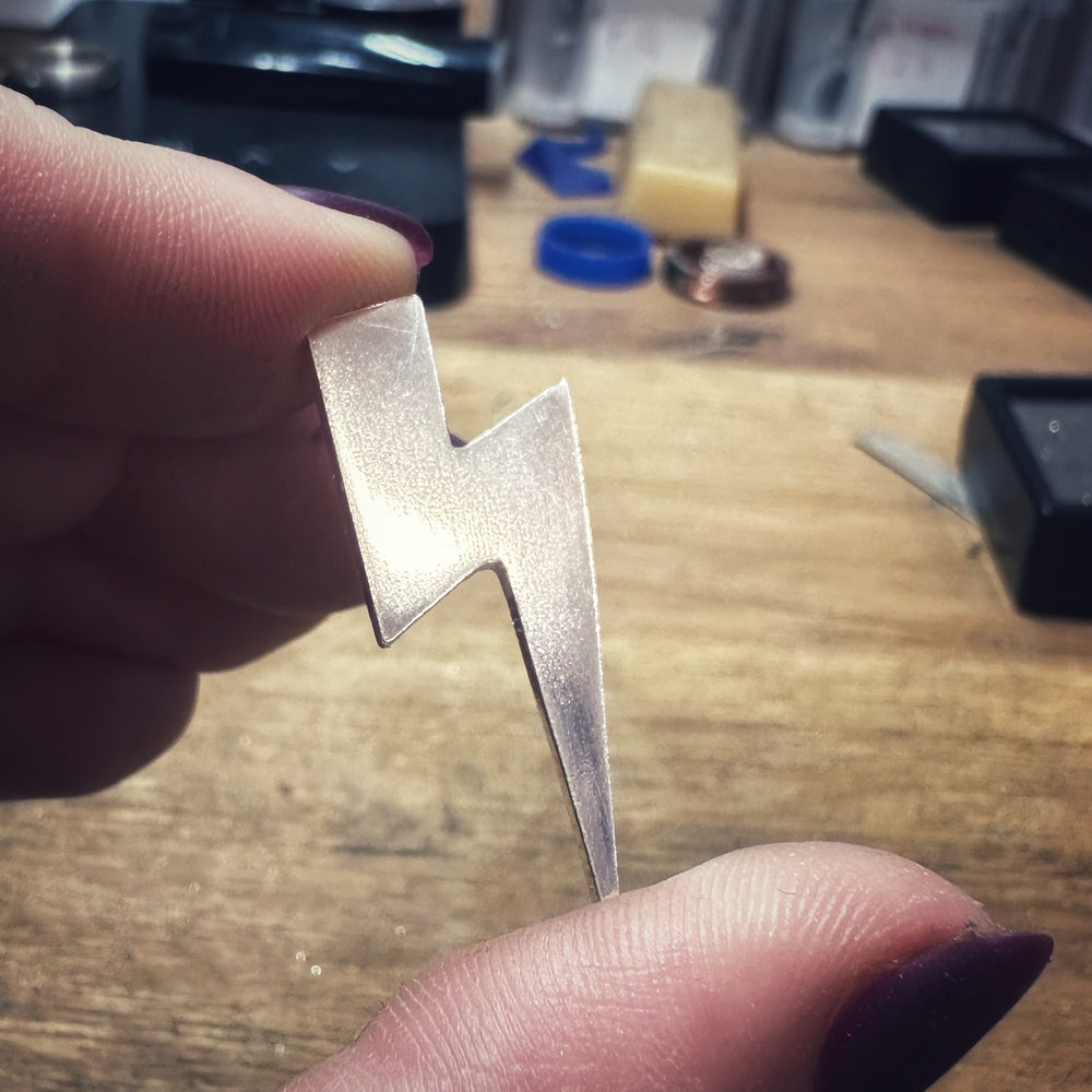 
                      
                        Thunderstruck Statement Earrings
                      
                    