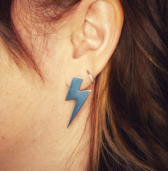 
                      
                        Thunderstruck Statement Earrings
                      
                    